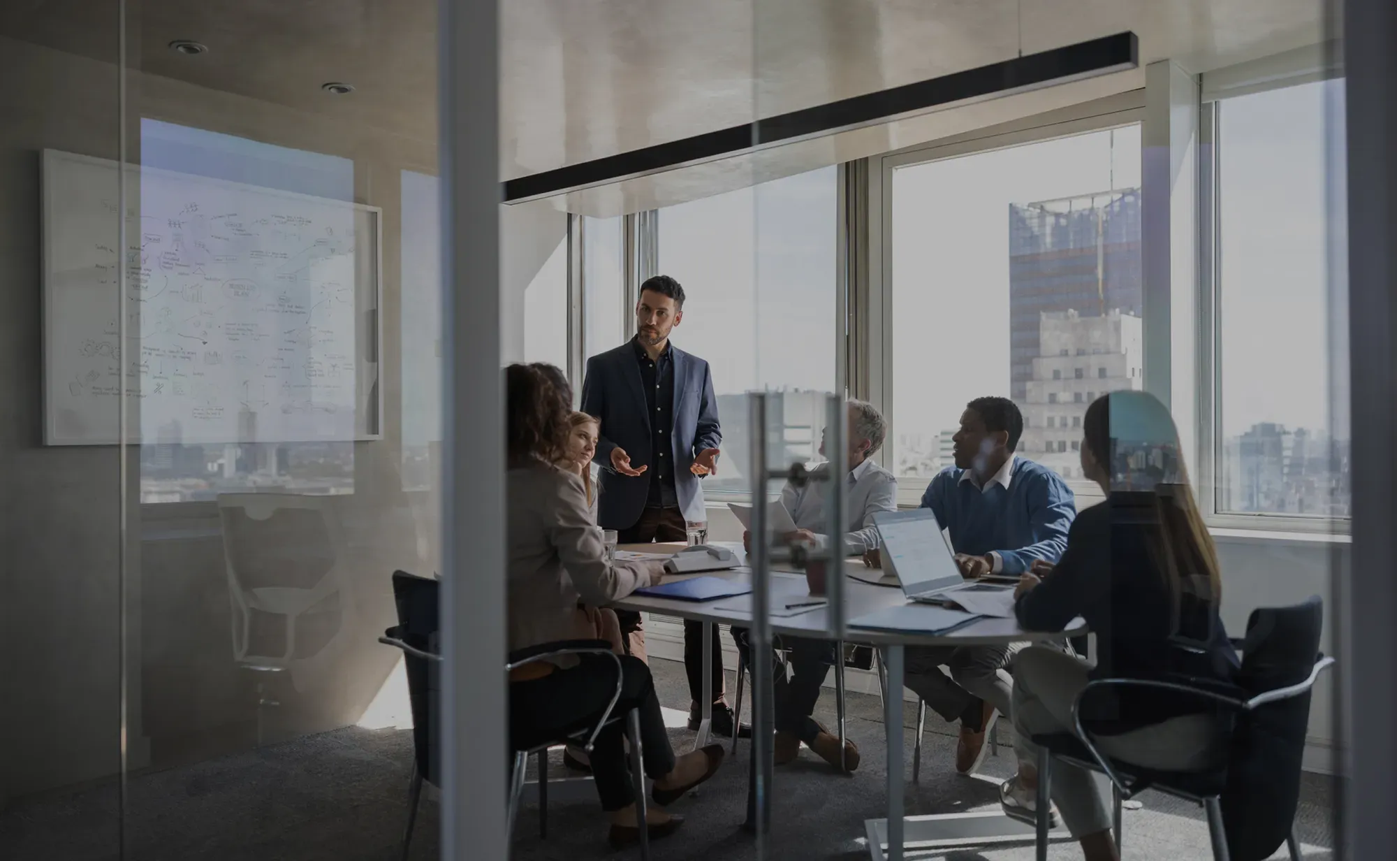 Leadership team reviewing results in a meeting room